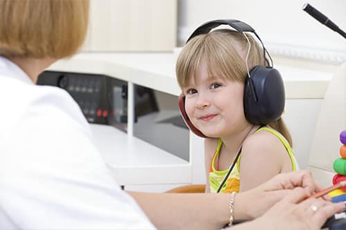 Child hearing exam for audiology now