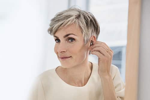 Woman with the best quality hearing aids